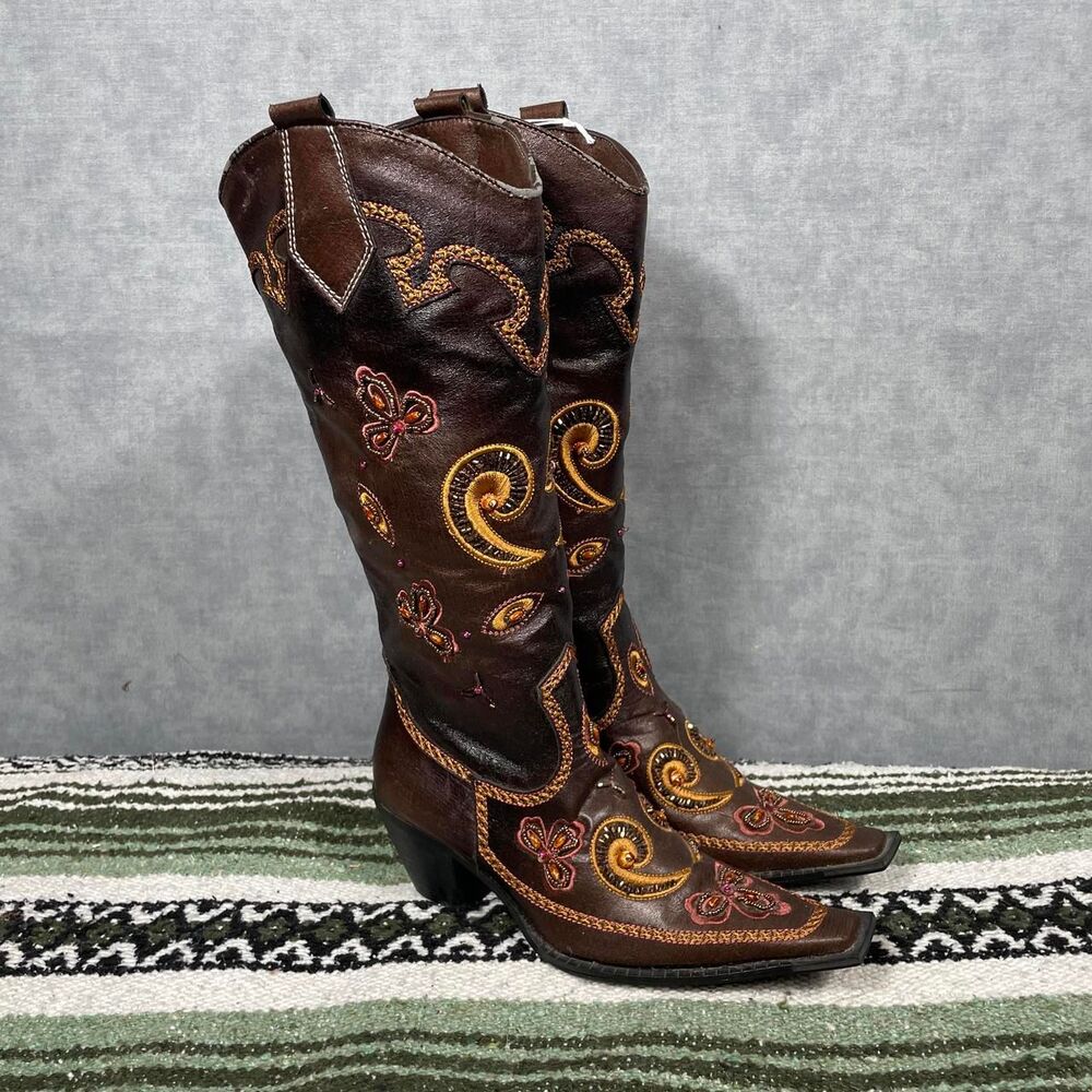 Unique cowboy boots with embroidered details.